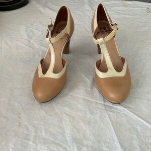 Two-tone Wonders t-strap heels.